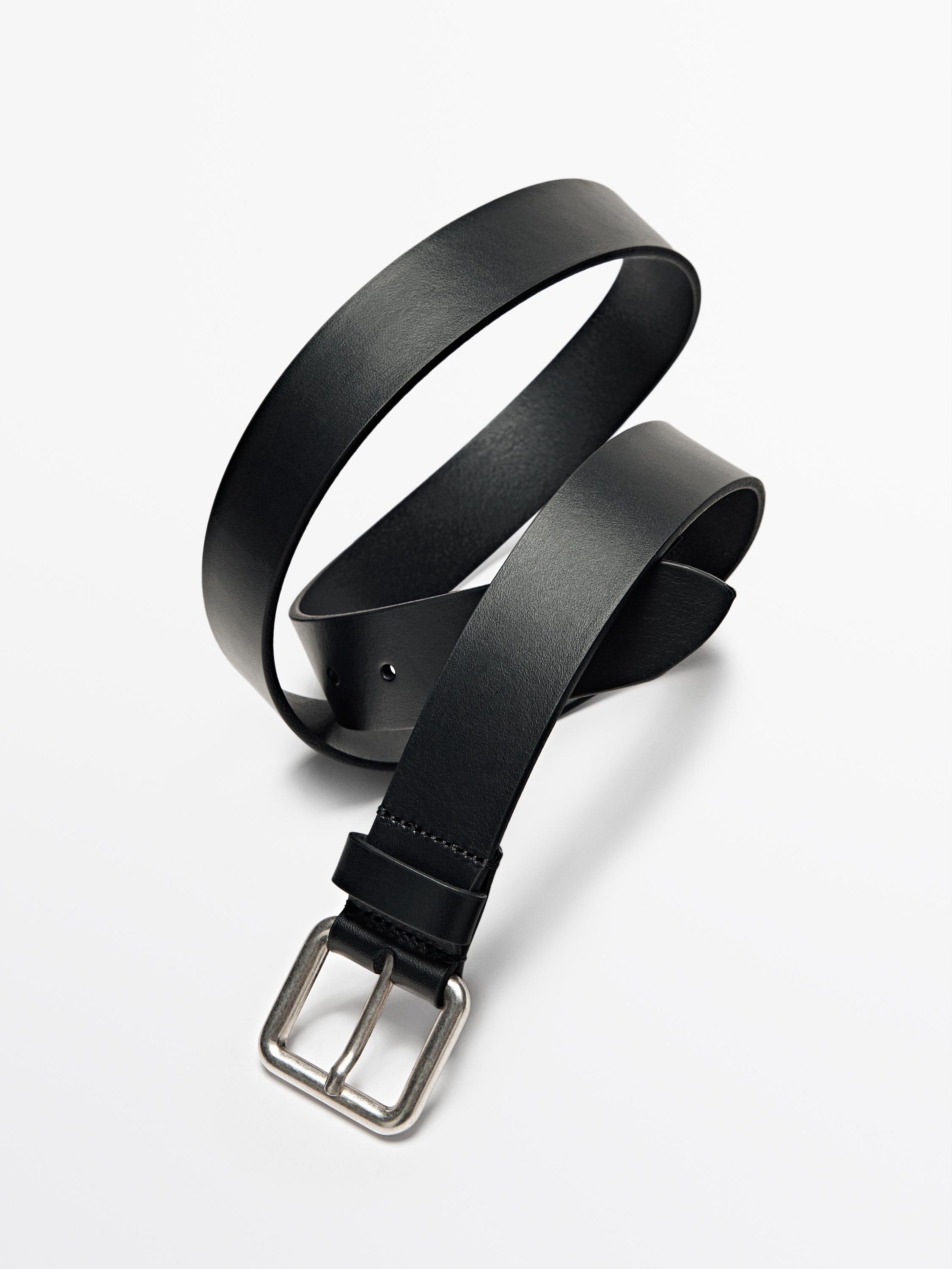 Leather belt with metallic buckle